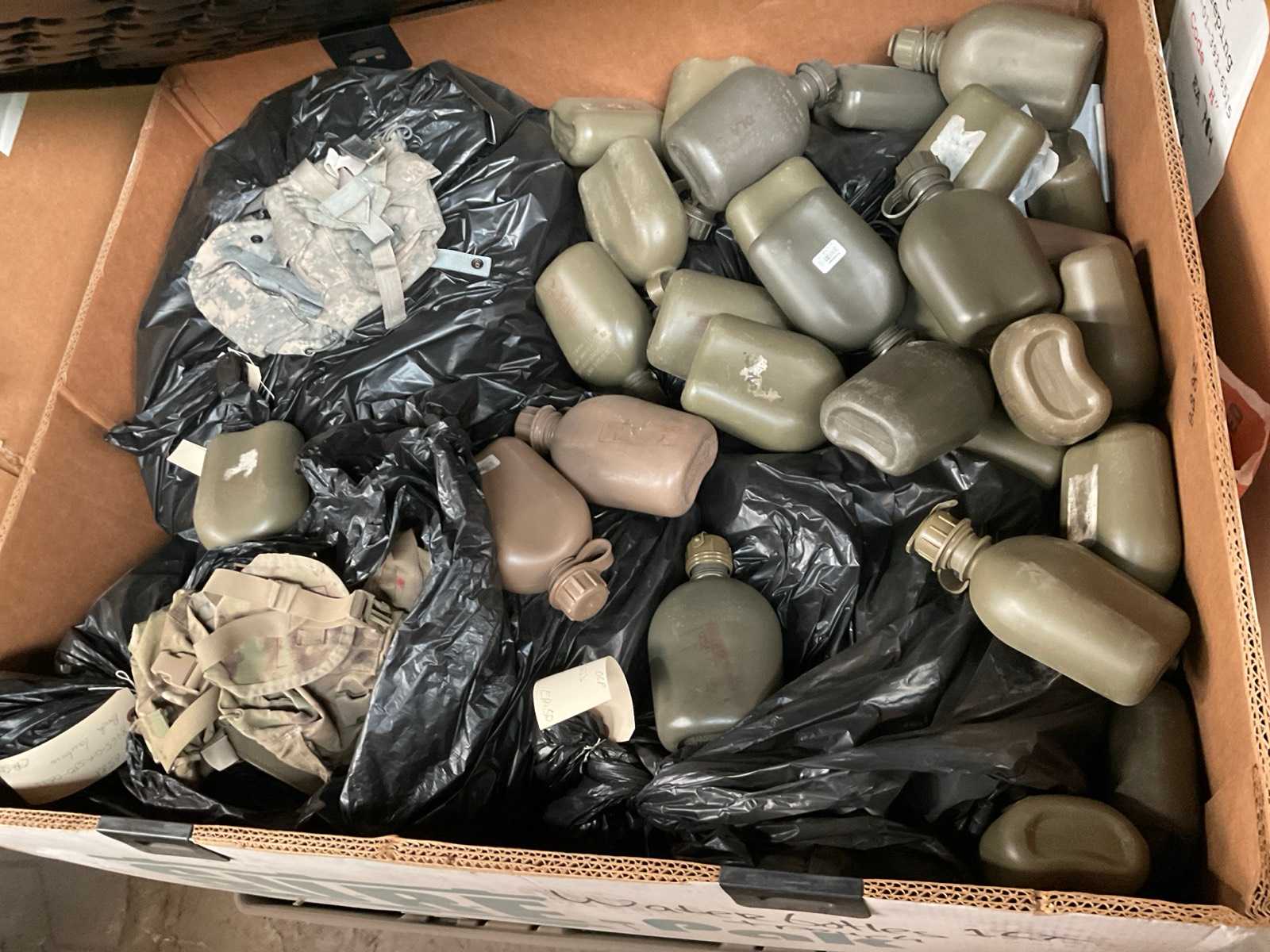 Lot of water bottles with pouches